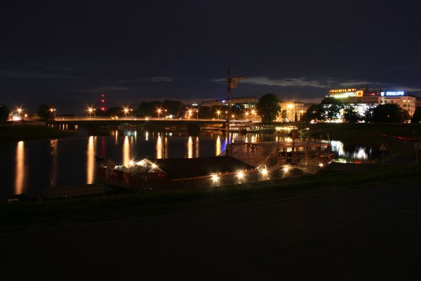 Vistual river near Wawel Castle, in background once famous Jubilat shopping center